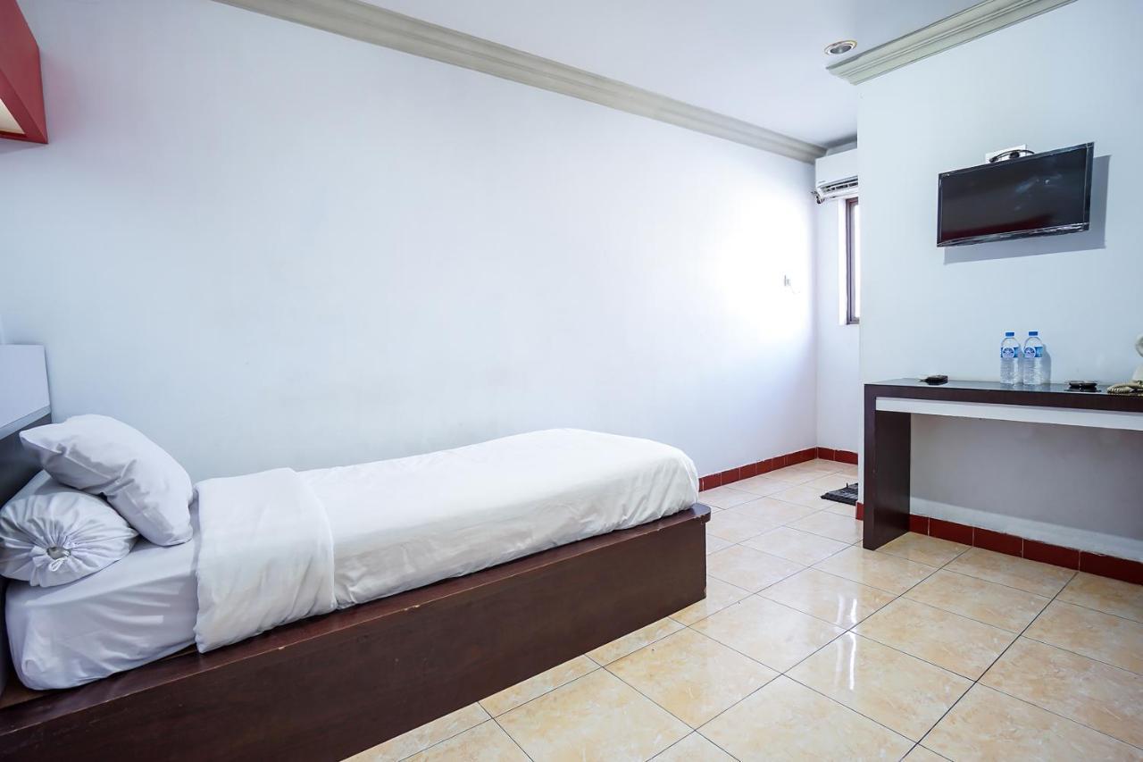 Hotel Capital O 3433 Plaza