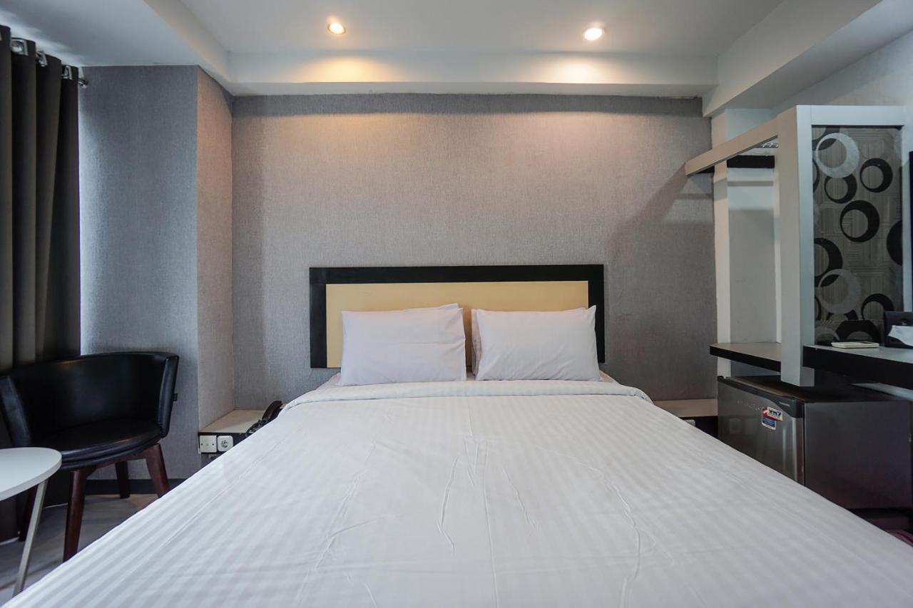 Hotel Capital O 3433 Plaza